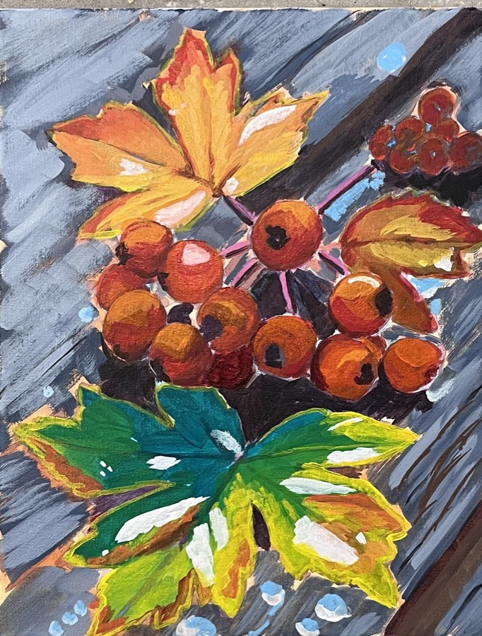 Red and orange berries clustered with golden flowers and green leaves on a blue-gray background.