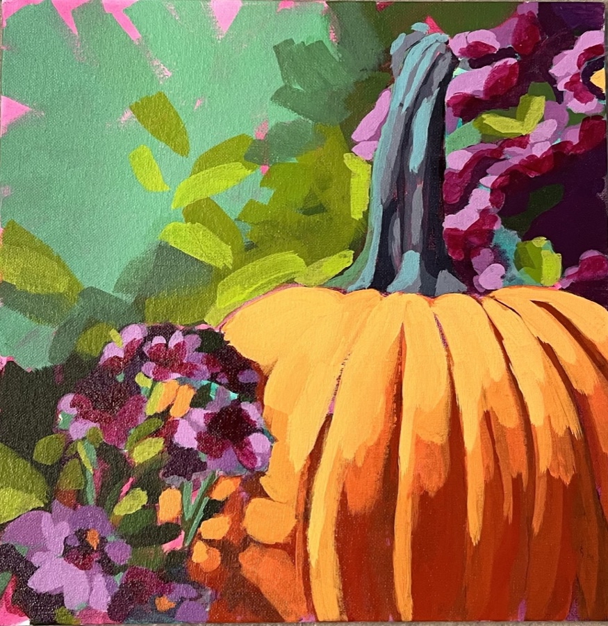 An orange pumpkin seen from above among magenta flowers and chartreuse leaves on jade green.