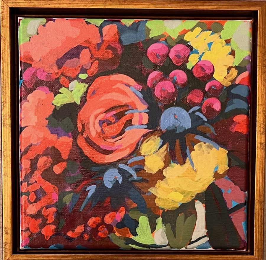 A densely packed floral painting of coral roses, magenta berries, and yellow peonies in a gold frame.